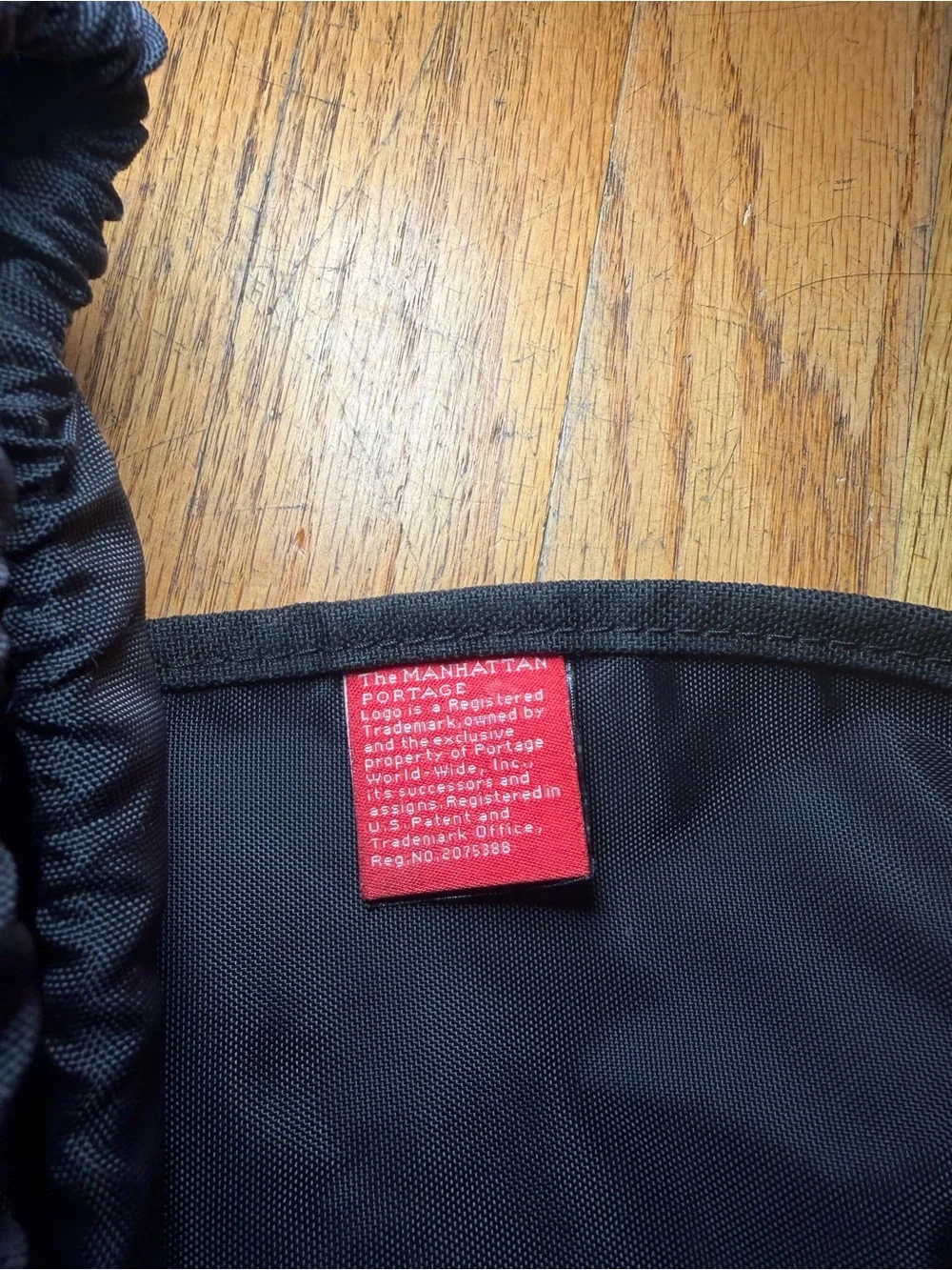 Manhattan Portage red backpack